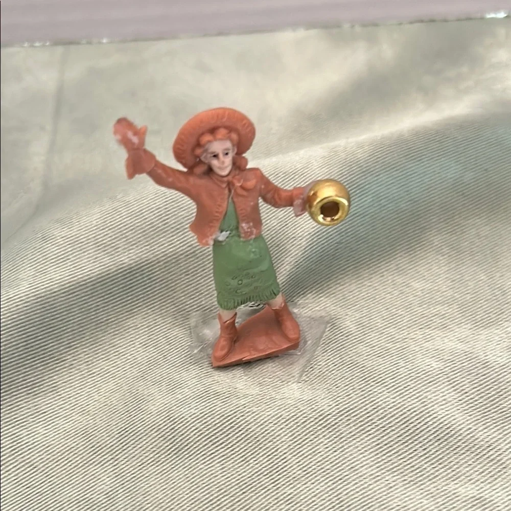 Charming Figurine with Green and Brown Attire